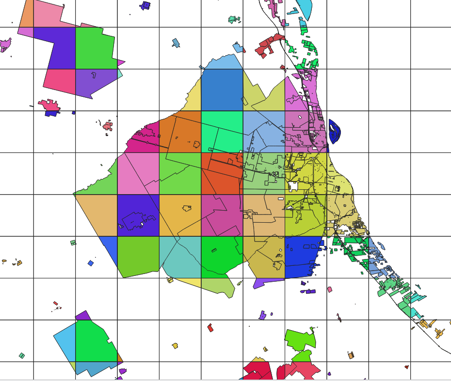 Result of running the intersection algorithm to clip the landuse vector polygons to the grid layer